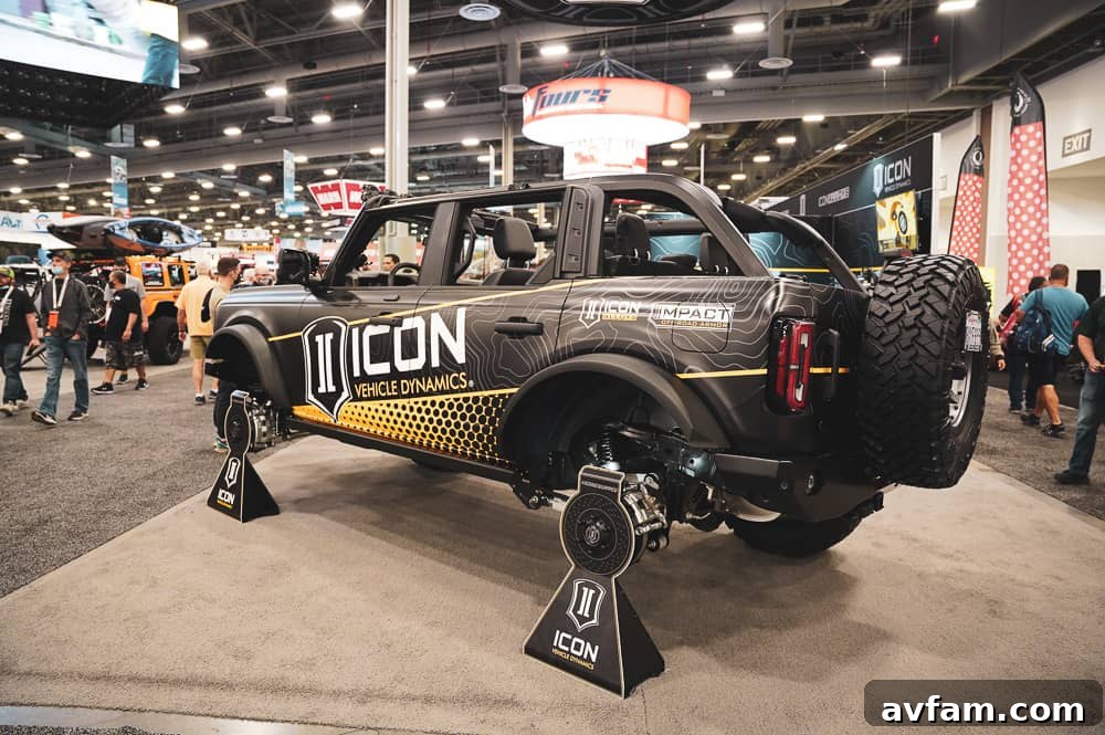 Custom Ford Bronco at SEMA White Ford Bronco with custom graphics and oversized tires at SEMA