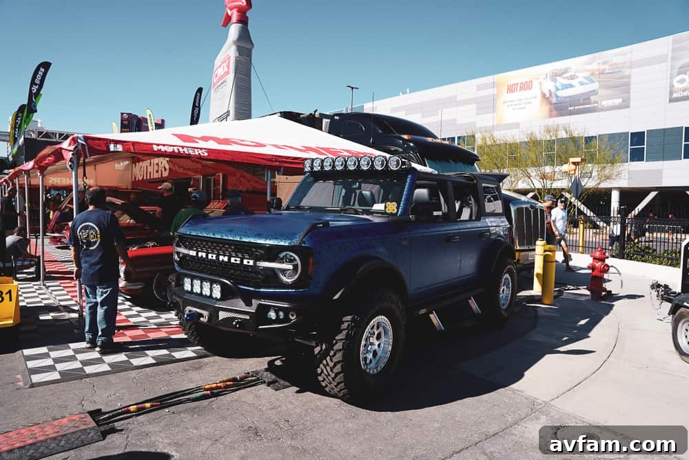 Custom Ford Bronco at SEMA Custom painted Ford Bronco with intricate graphics and detailed off-road features at SEMA