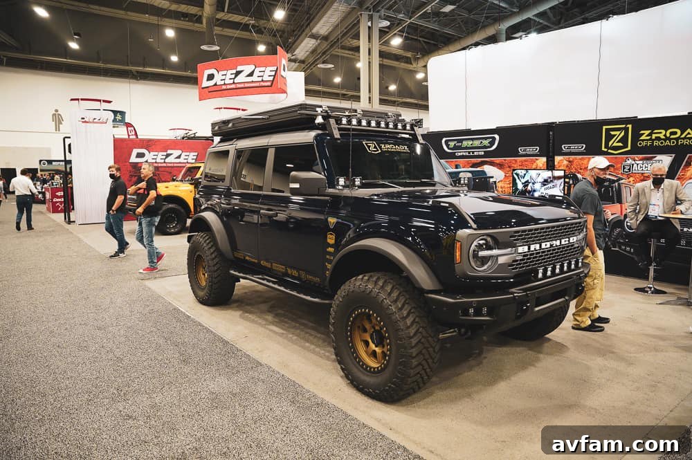 Custom Ford Bronco at SEMA Aggressive yellow Ford Bronco with large tires and lift kit at SEMA