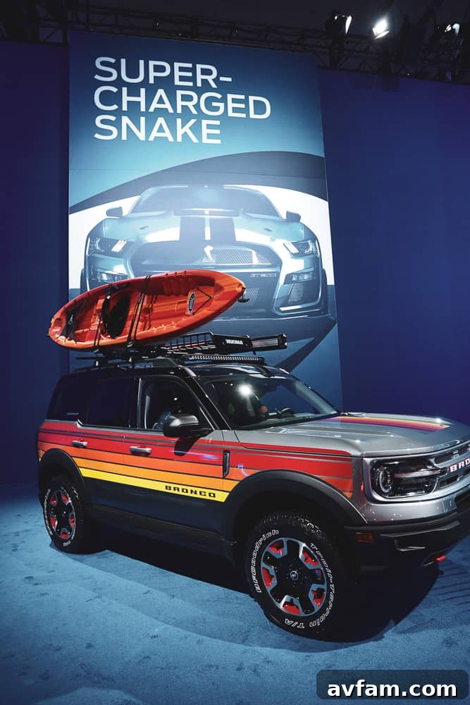 Custom Ford Bronco at SEMA Overland equipped Ford Bronco with a roof-top tent and recovery boards at SEMA