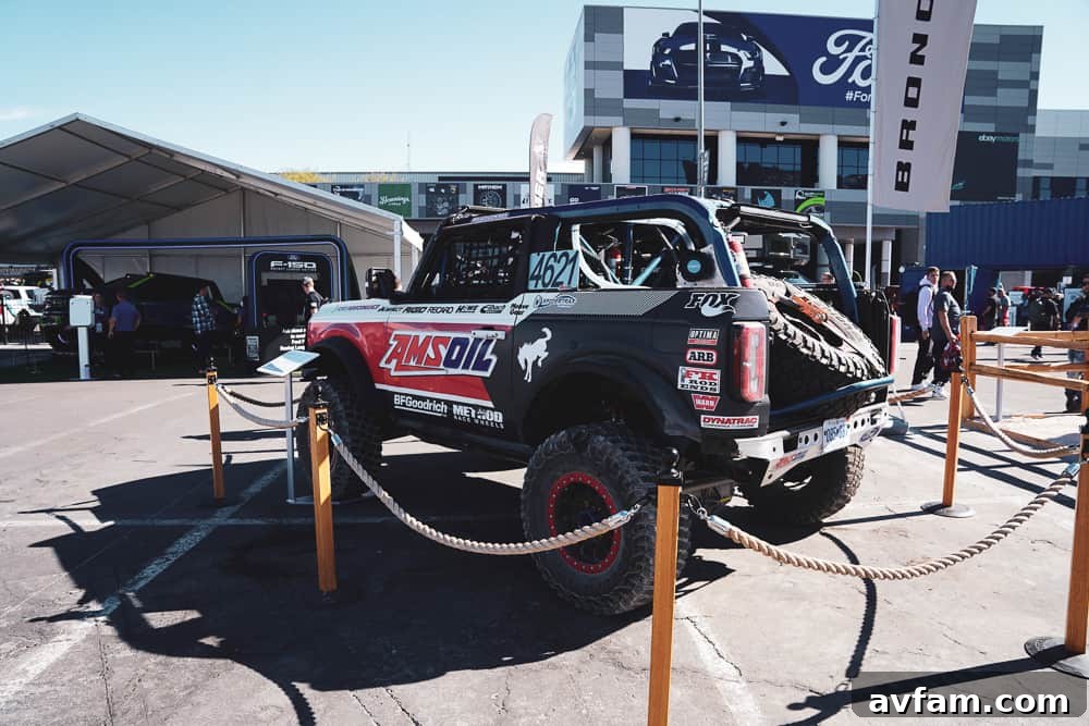Custom Ford Bronco at SEMA Customized Ford Bronco in a striking color, highlighting aftermarket fender flares at SEMA