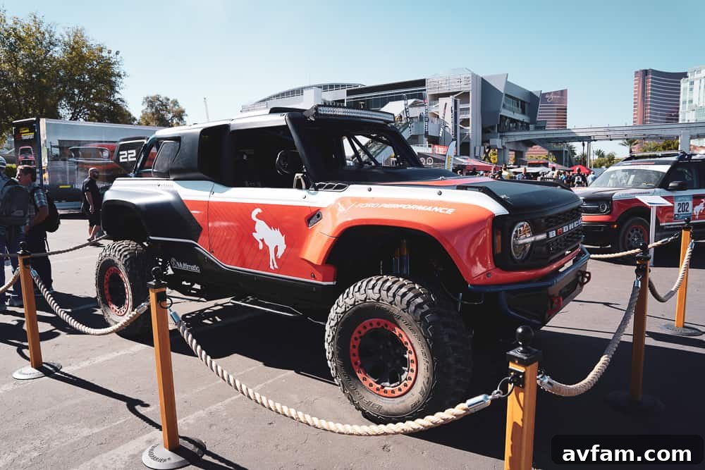 Custom Ford Bronco at SEMA High-clearance Ford Bronco build with heavy-duty rock sliders and custom graphics at SEMA