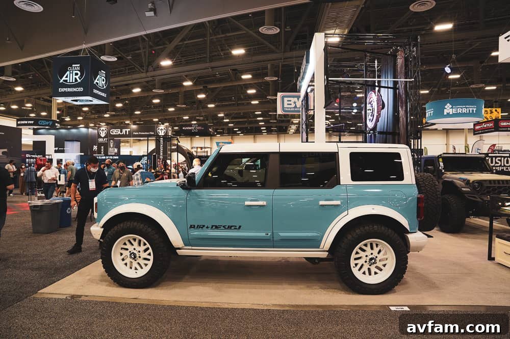 Custom Ford Bronco at SEMA Ford Bronco with unique custom paint job and off-road wheels at SEMA