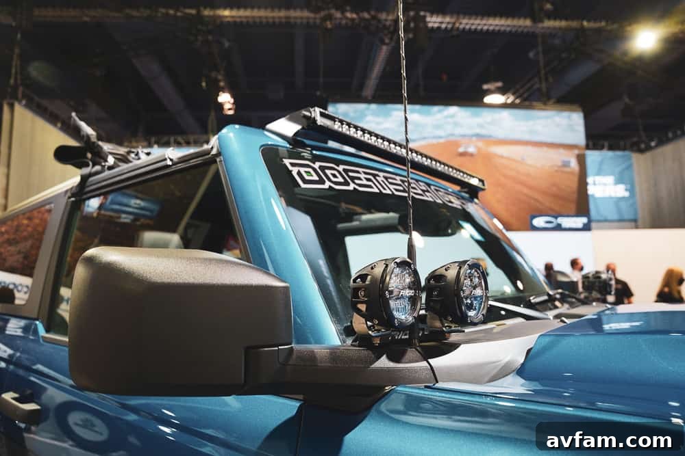 Custom Ford Bronco at SEMA Side profile of a Ford Bronco with custom wheels and a practical roof rack system at SEMA