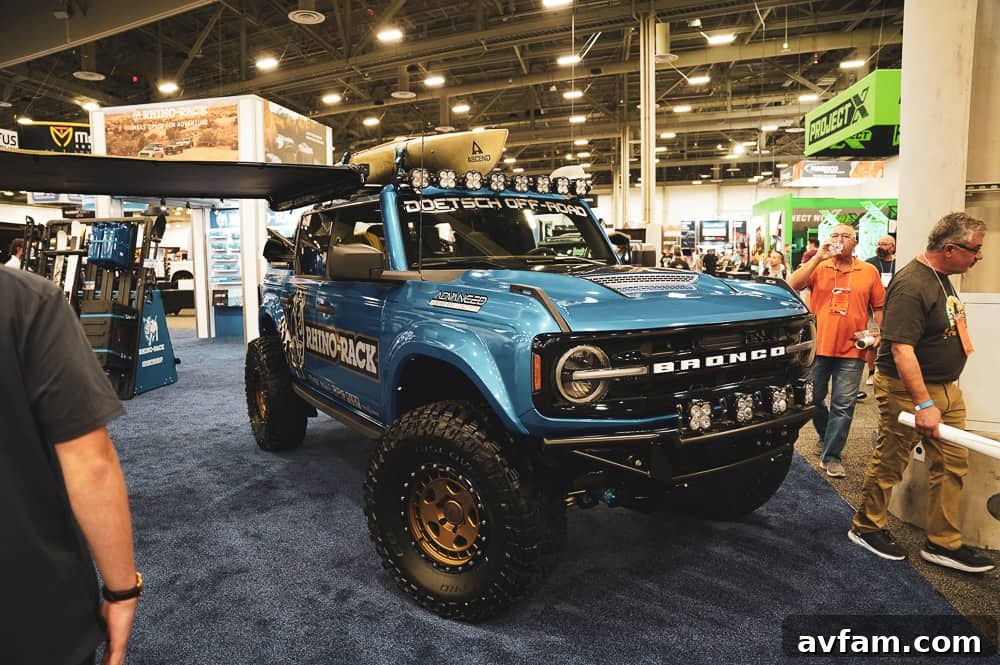 Custom Ford Bronco at SEMA Bronze Ford Bronco with classic styling cues and modern off-road tires at SEMA