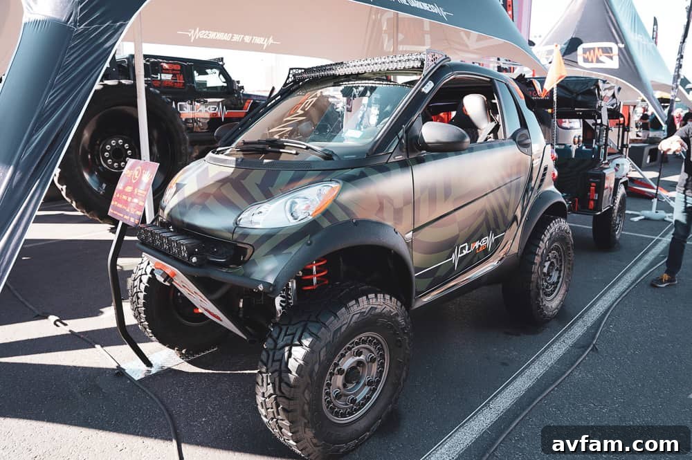 A custom full-size SUV with an elaborate roof rack system and overland accessories, ready for exploration.