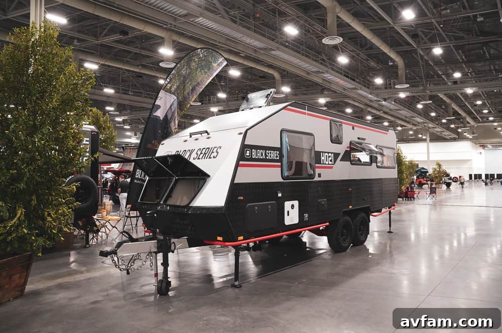 A rugged utility vehicle featuring a robust canopy, roof rack, and all-terrain tires, ideal for work or adventure.
