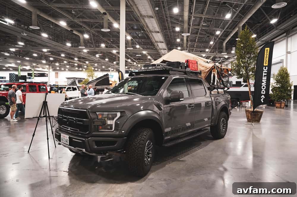 A custom Ford Bronco with unique paintwork and contrasting fender flares, reflecting personalized style.