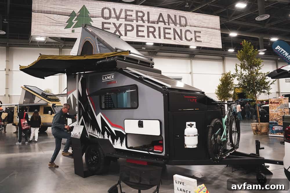 A powerful custom truck showcasing a heavy-duty suspension system and large mud-terrain tires.
