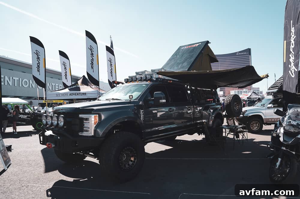 A sleek custom pickup truck with a widebody kit and performance wheels, showcasing modern aesthetics.