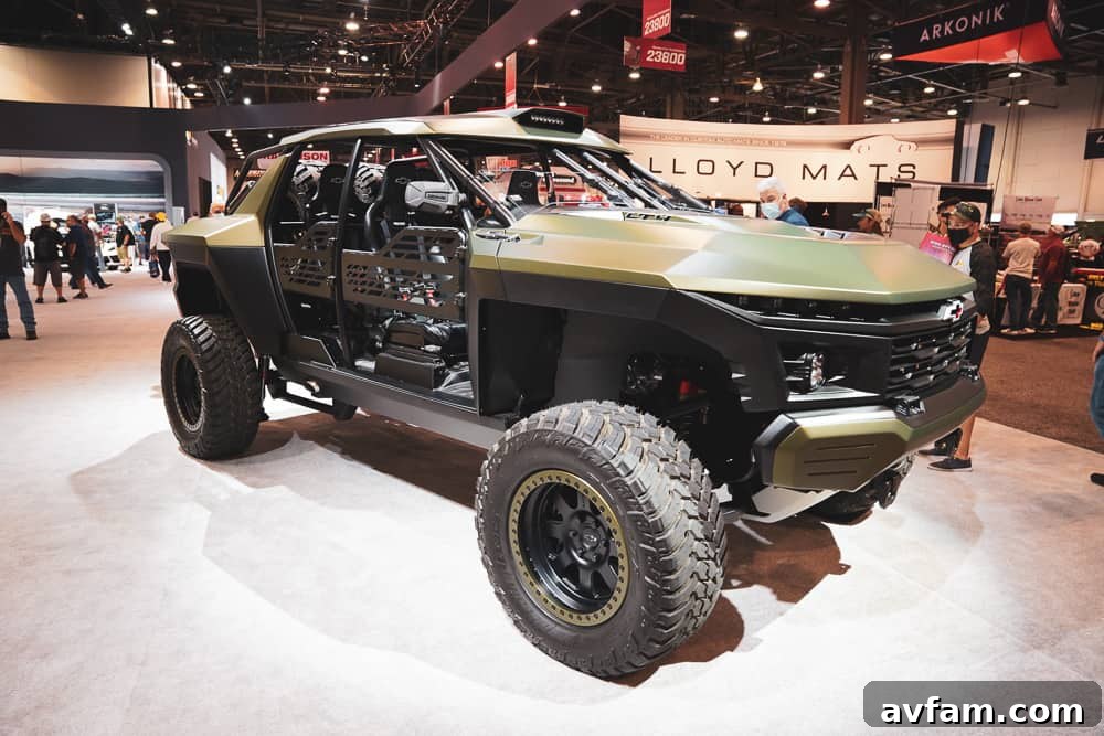 A vibrant green custom truck with a powerful stance, showcasing intricate custom paint and large wheels.