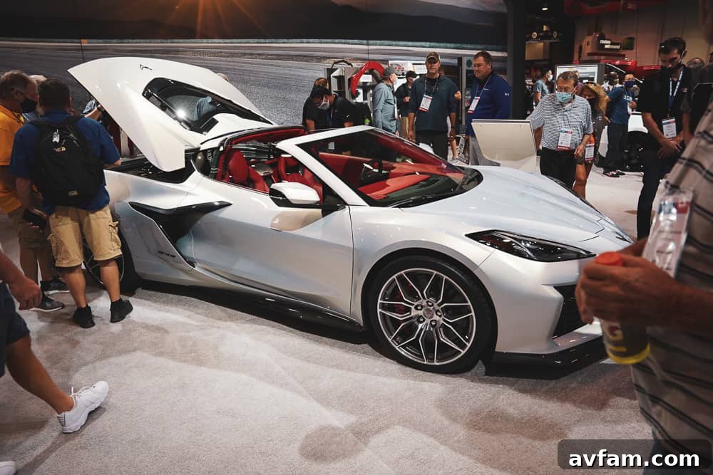 A sleek custom sports car with aerodynamic body modifications and a metallic paint finish.