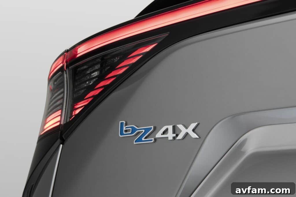 Toyota bZ4X parked with a clear view of its side and distinct wheel arches