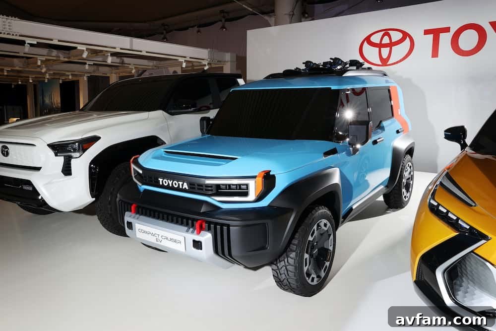 Toyota executive presenting the BEV concept vehicles with a vision statement