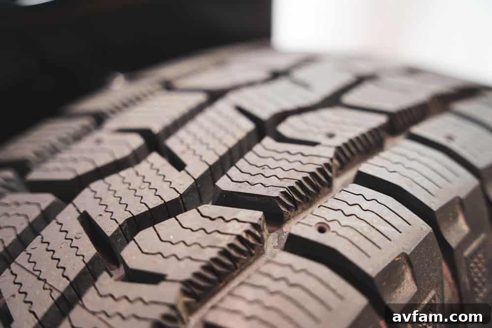 Cooper Discoverer Snow Claw Tire Tread Close-up of Cooper Discoverer Snow Claw tire tread showing Snow Groove Technology