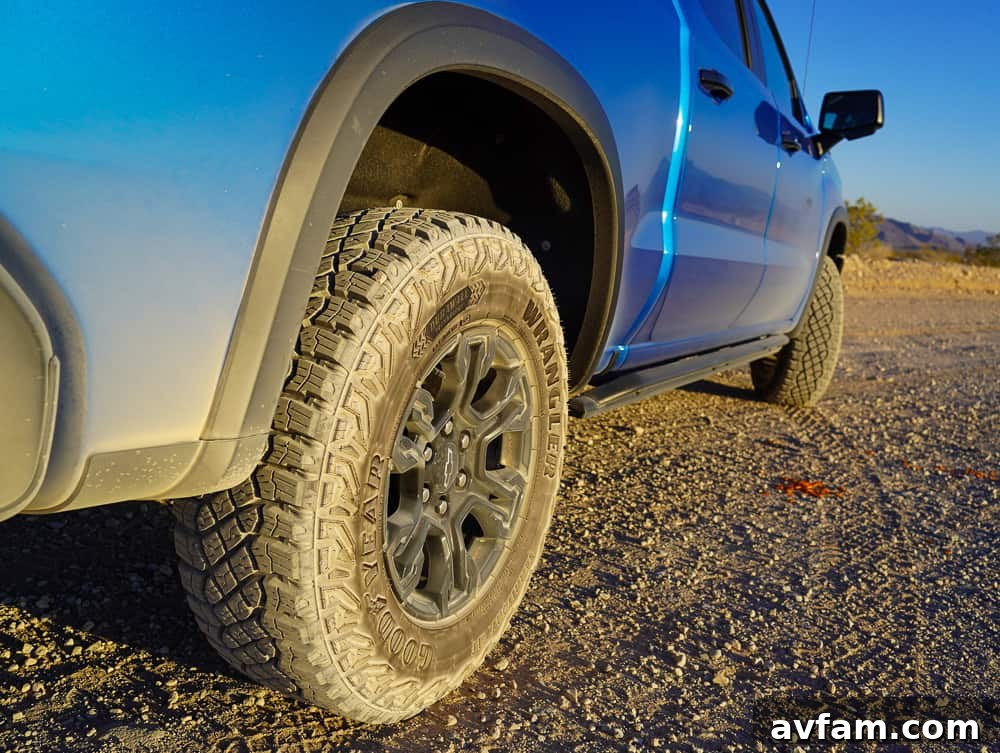 Chevy Silverado ZR2 in motion on a dusty trail