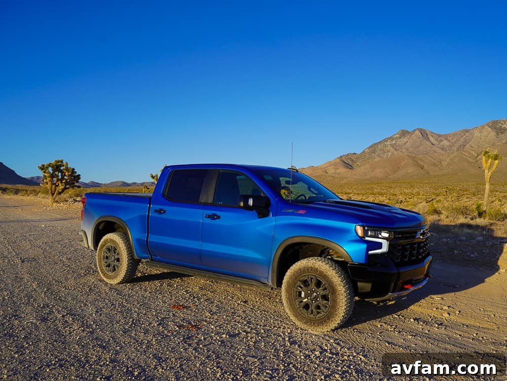 Chevy Silverado ZR2 making a turn on a dirt path