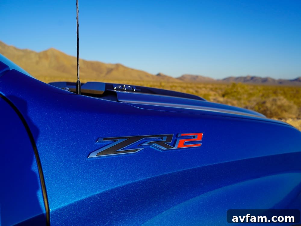 Chevy Silverado ZR2 driving through a shadowed canyon