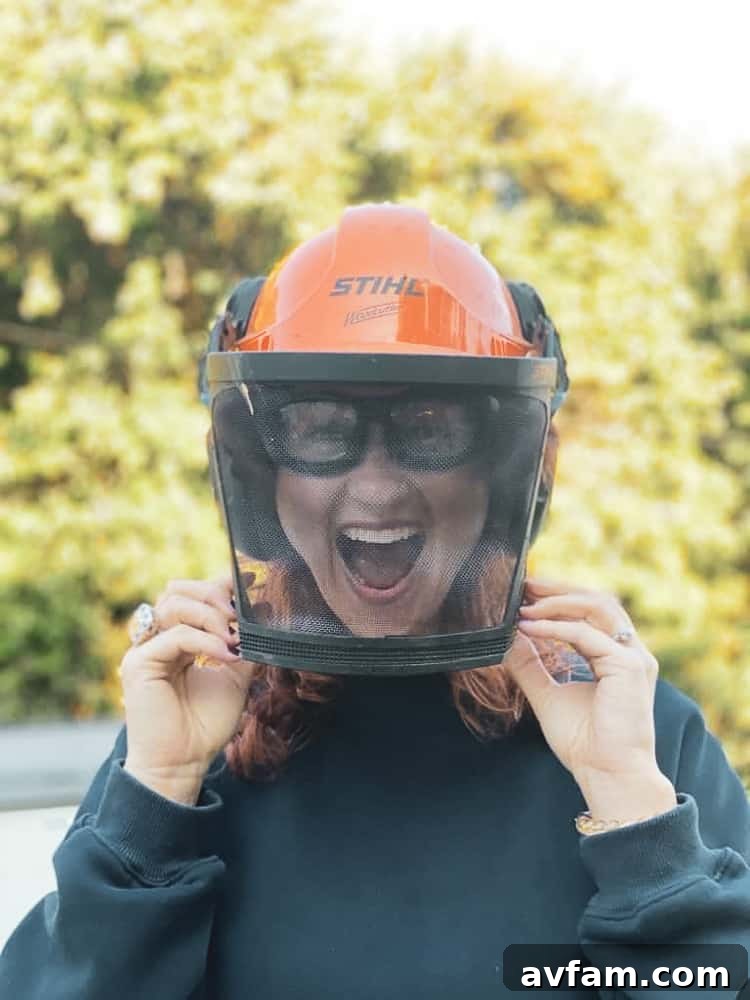 Person wearing chainsaw safety gear