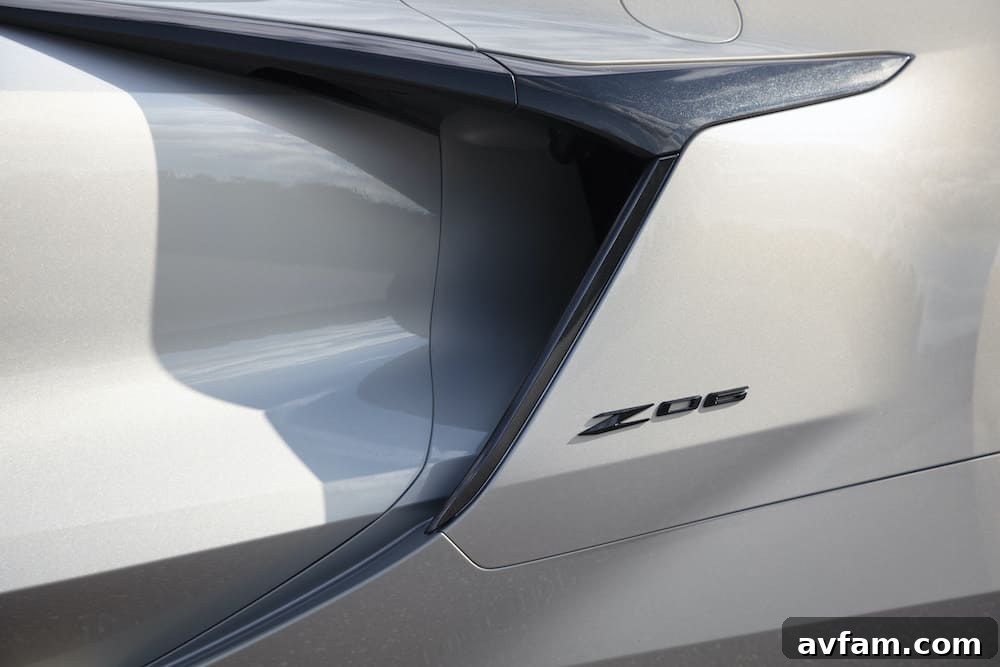 Side profile of the 2023 Corvette Z06, highlighting the large brake calipers and intricate wheel design.