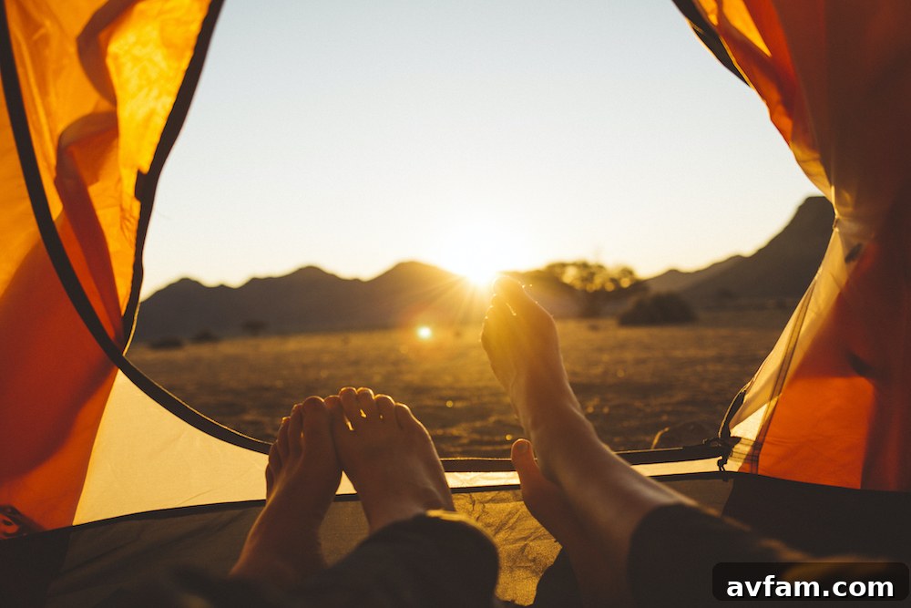 A couple embracing intimately in a cozy, natural setting, suggesting romantic escapades and the comfort of CBD intimacy products.