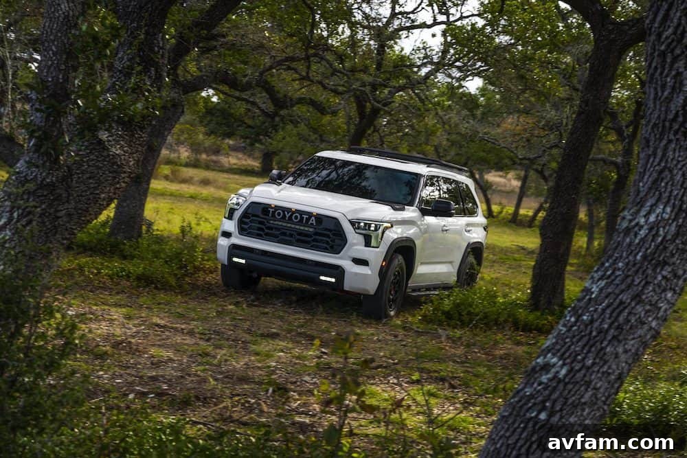 Front fascia detail of the 2023 Toyota Sequoia, emphasizing the grille and badging.