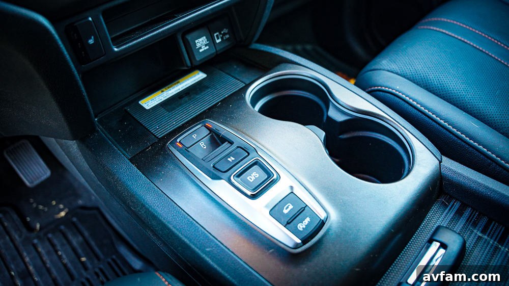 Honda Passport Door Panel The 2022 Honda Passport's interior door panel with controls.
