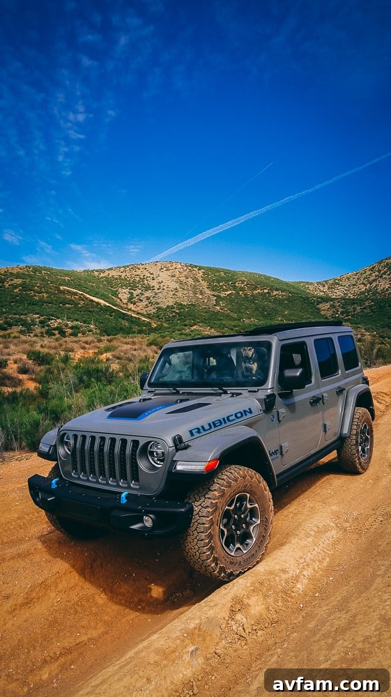 Jeep Wrangler 4XE Silent Trailblazer 31 Side view of the Jeep Wrangler 4XE's robust suspension and undercarriage.