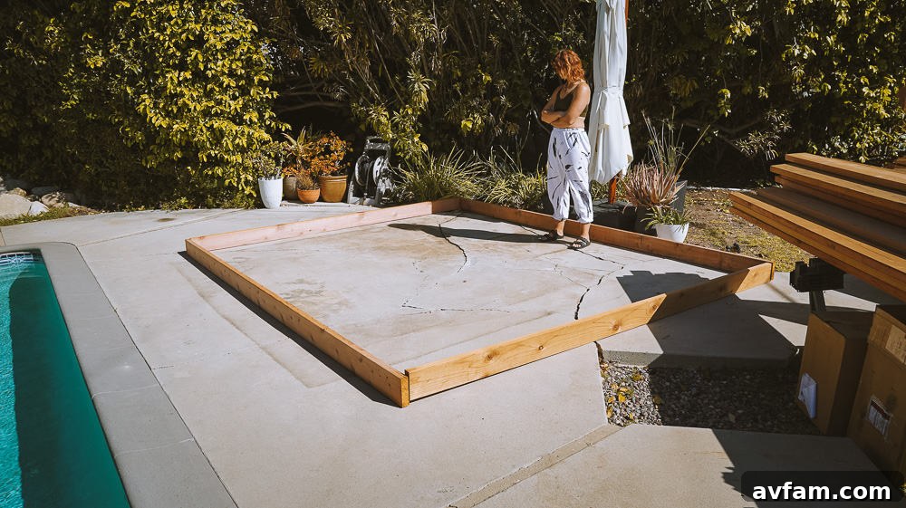 Sketch or plan for the simple rectangular redwood deck design on the concrete patio