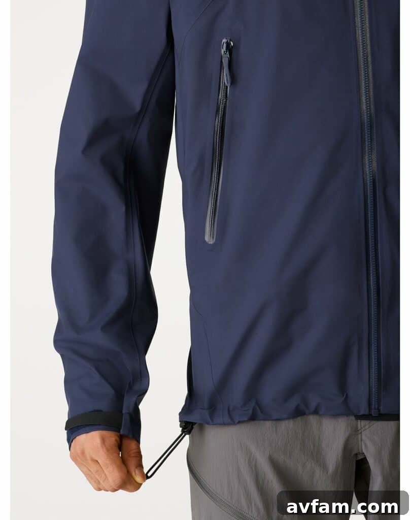 Arc'teryx Beta Stylish Fit User posing confidently with Arc'teryx Beta jacket, showcasing its modern fit and stylish appearance.