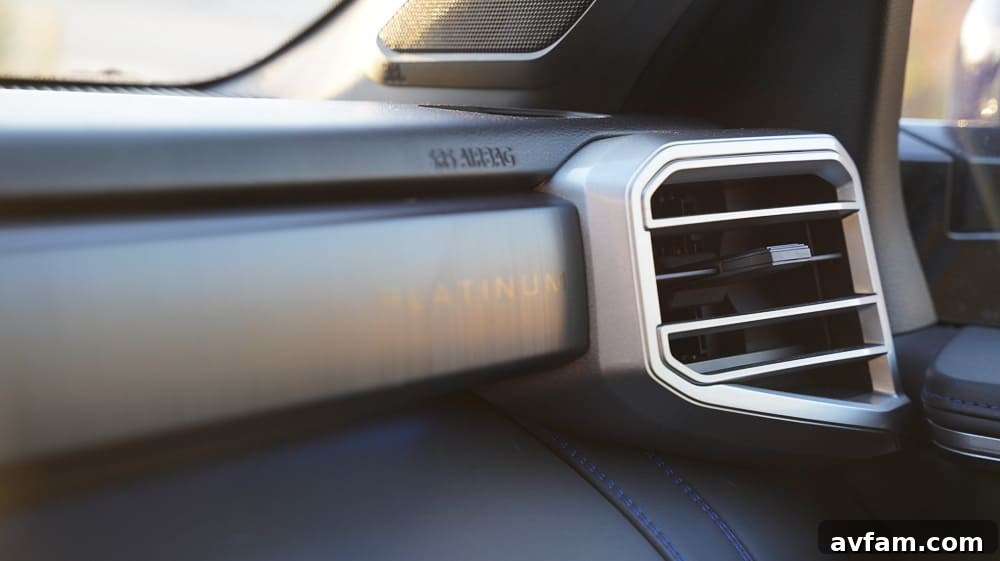 The Tundra showcasing its impressive ground clearance and sturdy tires on a rugged trail.