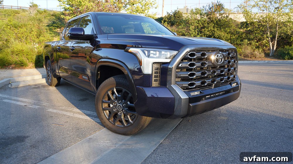 The Tundra's side view, showcasing its crew cab configuration and wheel design.