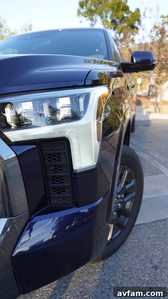 A vertical shot focusing on the Tundra's infotainment screen and surrounding controls.