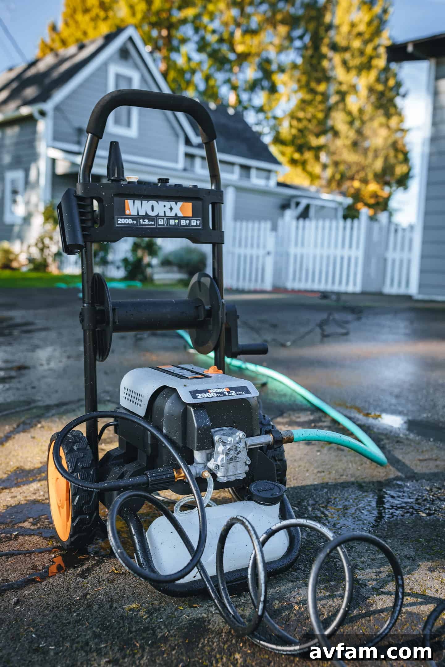 Detailed view of the Worx pressure washer's handle and trigger assembly, showing ergonomic design.