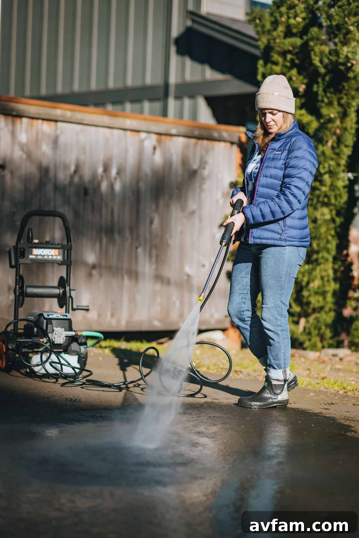 The soap tank and connections on the Worx pressure washer, highlighting ease of detergent application.