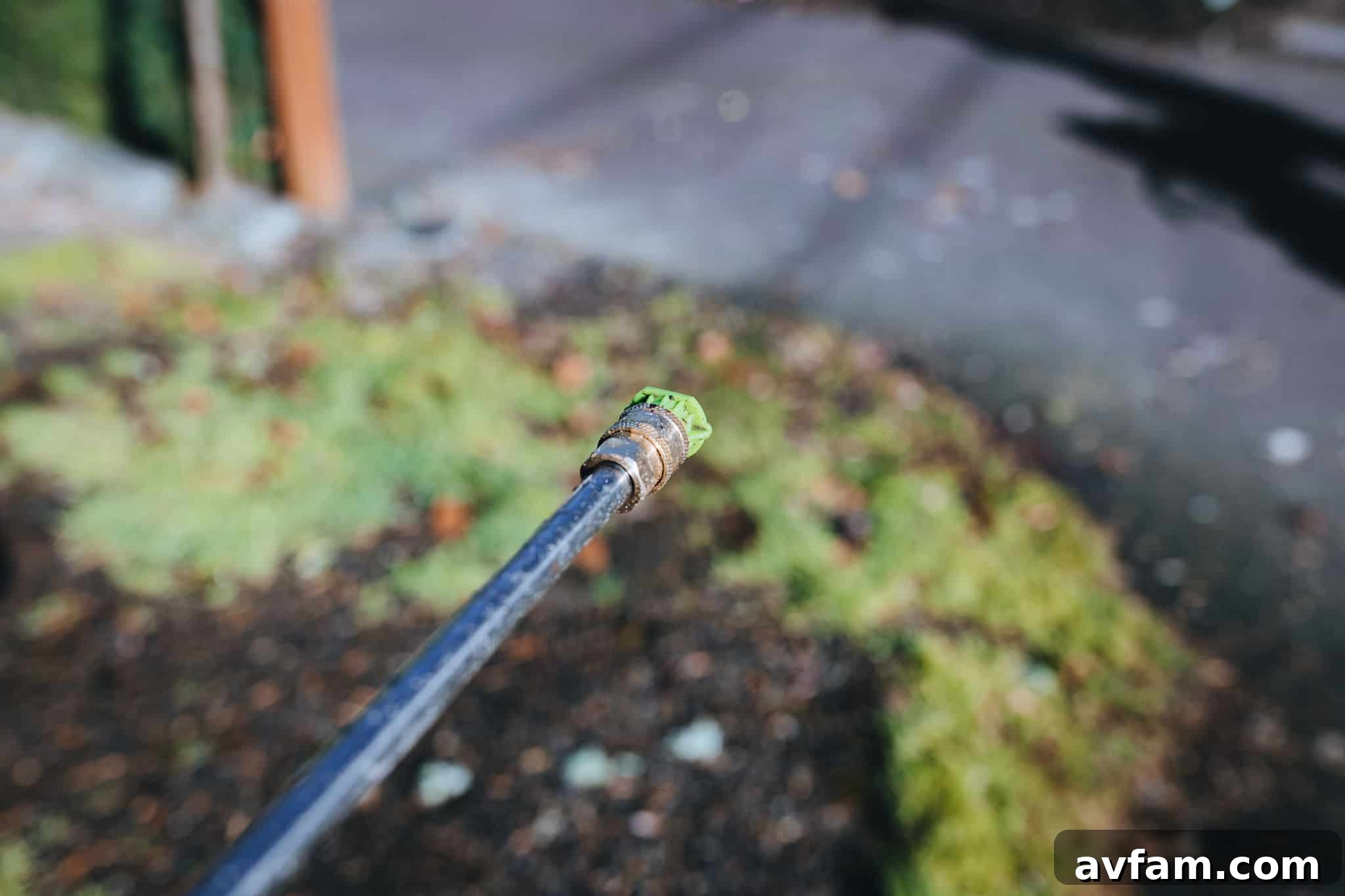 Worx 2000 PSI electric pressure washer connected and ready for use in an outdoor setting, symbolizing readiness.