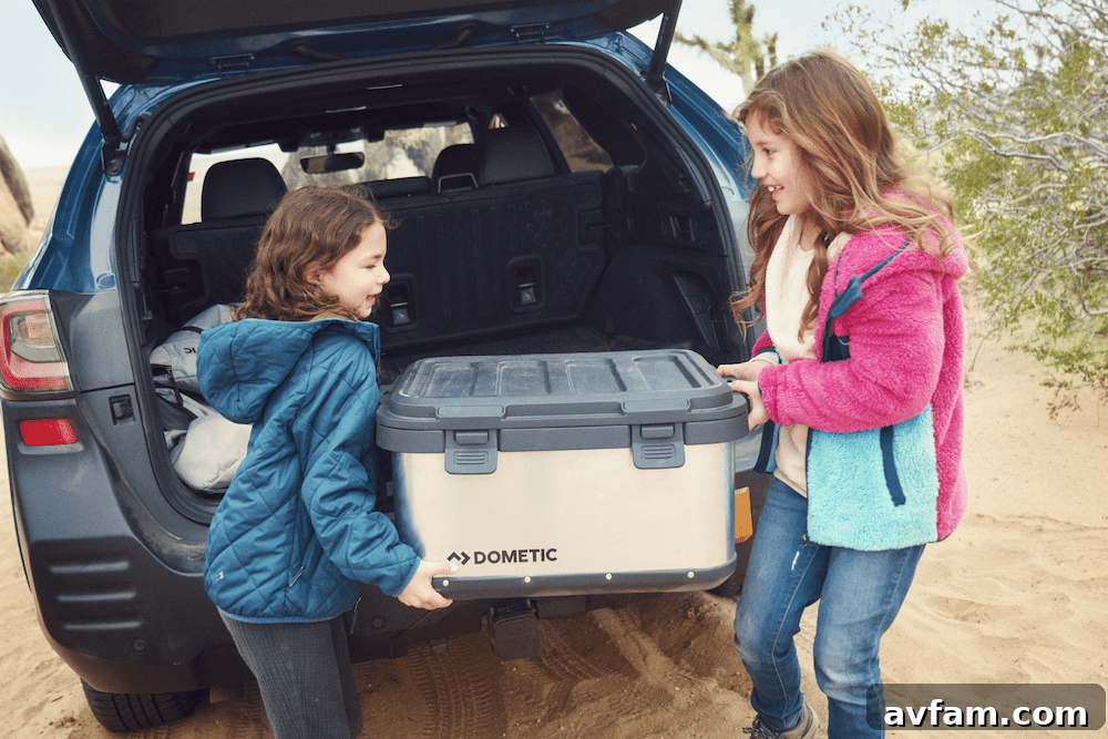 Dometic Go water jug and faucet in a camping scene
