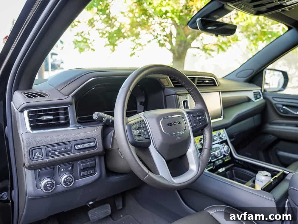 GMC Yukon XL Denali interior with focus on second-row seating