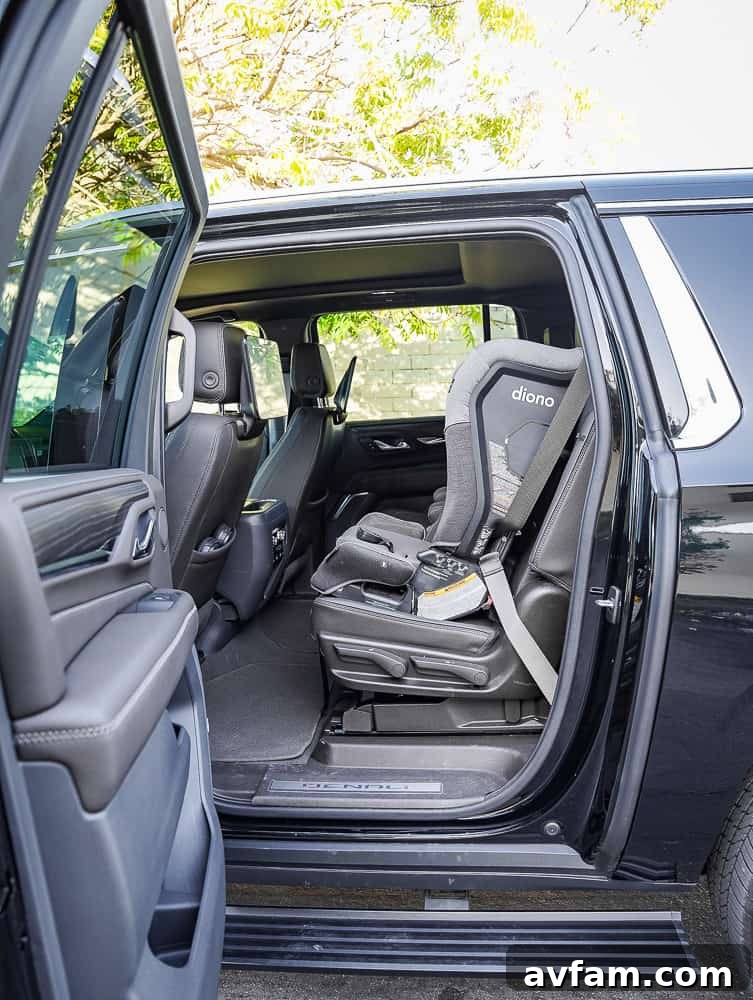 GMC Yukon XL Denali passenger seat area, highlighting comfort features
