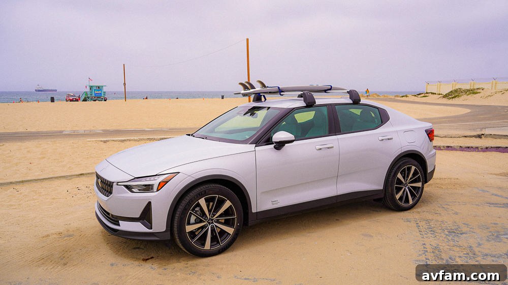 Polestar 2 parked with its doors open, showing the spacious cabin