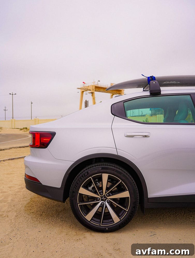 Polestar 2 rear view, emphasizing the distinctive full-width taillight design
