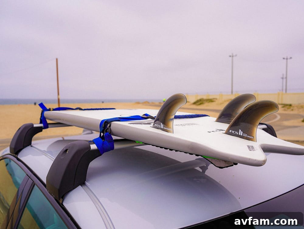 Polestar 2 parked at the beach, with waves in the background