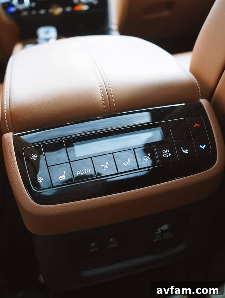 Luxurious quilted leather interior of the Infiniti QX60, highlighting the craftsmanship.