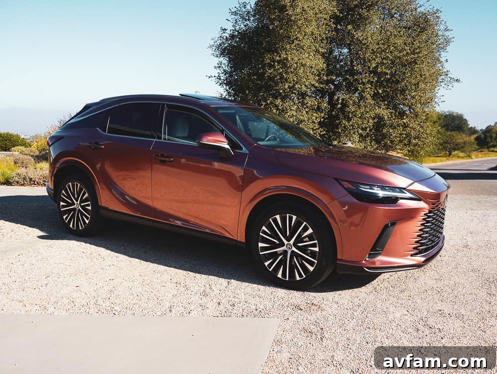 Panoramic view of the 2023 Lexus RX 500h F Sport Performance interior from the rear seats.
