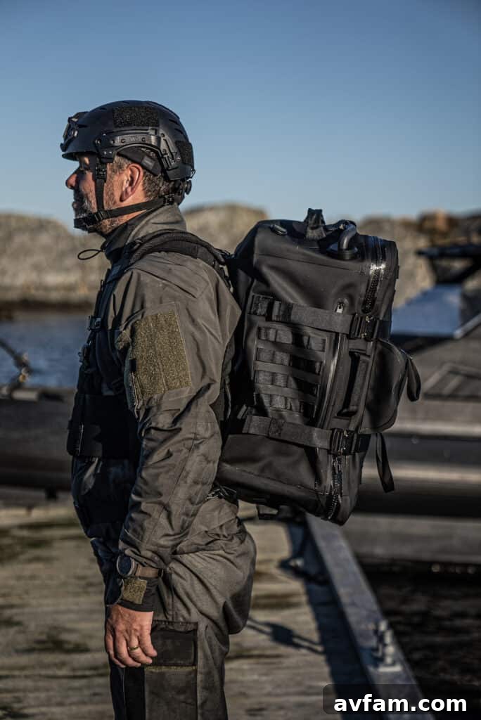 Handling the Pro Stealth 50L Subtech Pro Stealth 50L Drybag being handled, showing size perspective.
