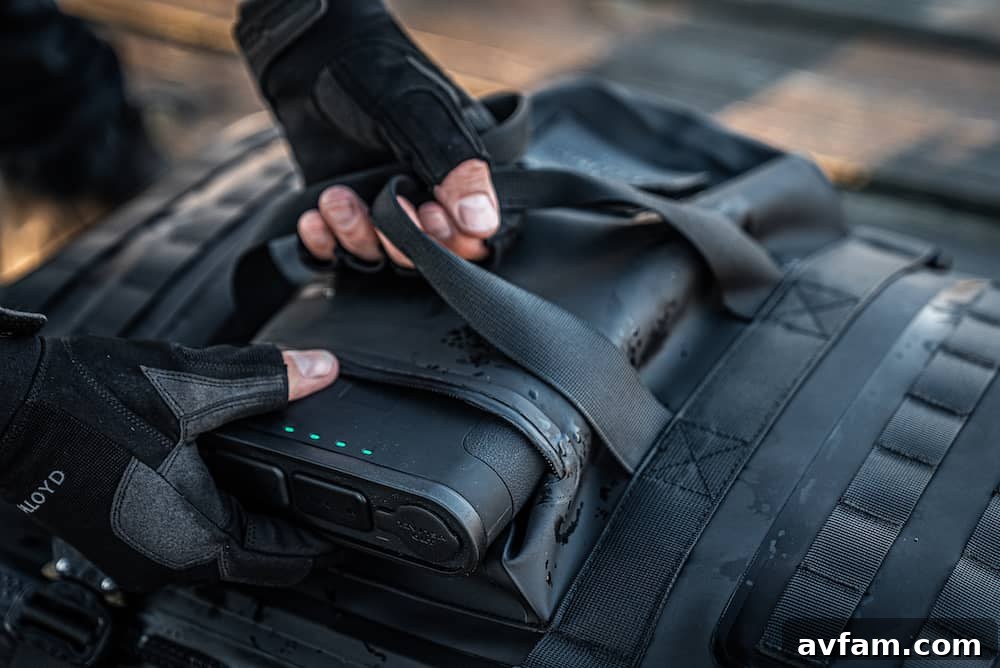 Ready for any terrain Subtech Pro Stealth 50L Drybag on a rocky shore.