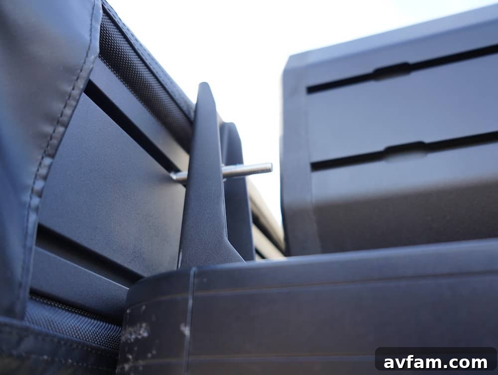 Rear view of the Roam ARC 270 awning providing shade extending behind the vehicle