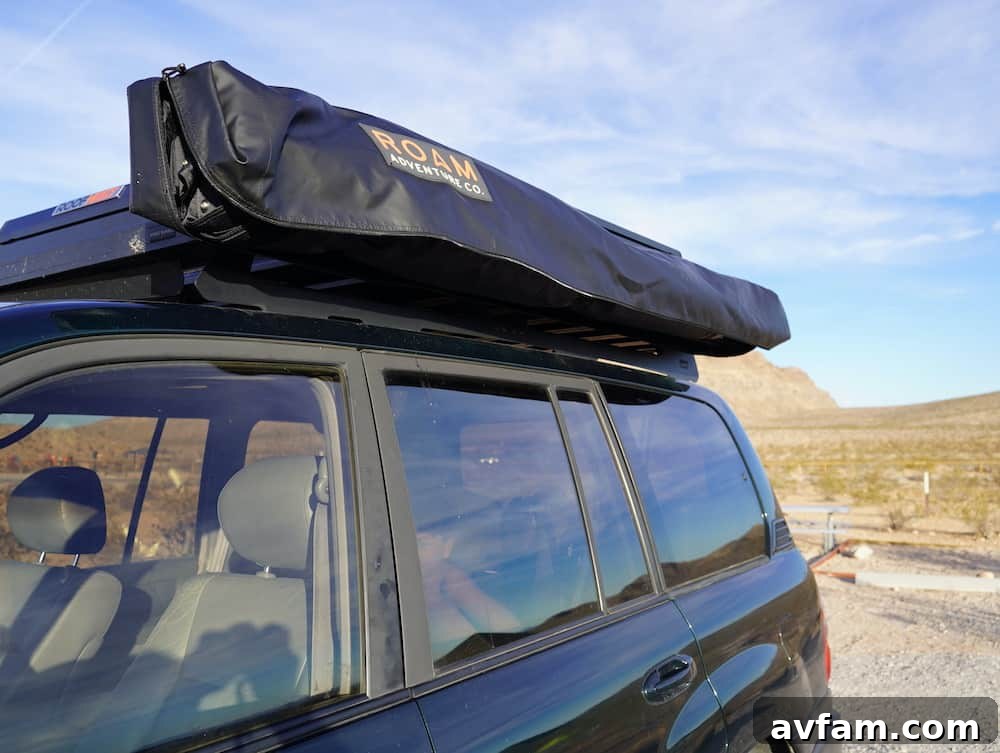 Detailed view of the Roam ARC 270 awning's quick release buckles and zipper for easy access