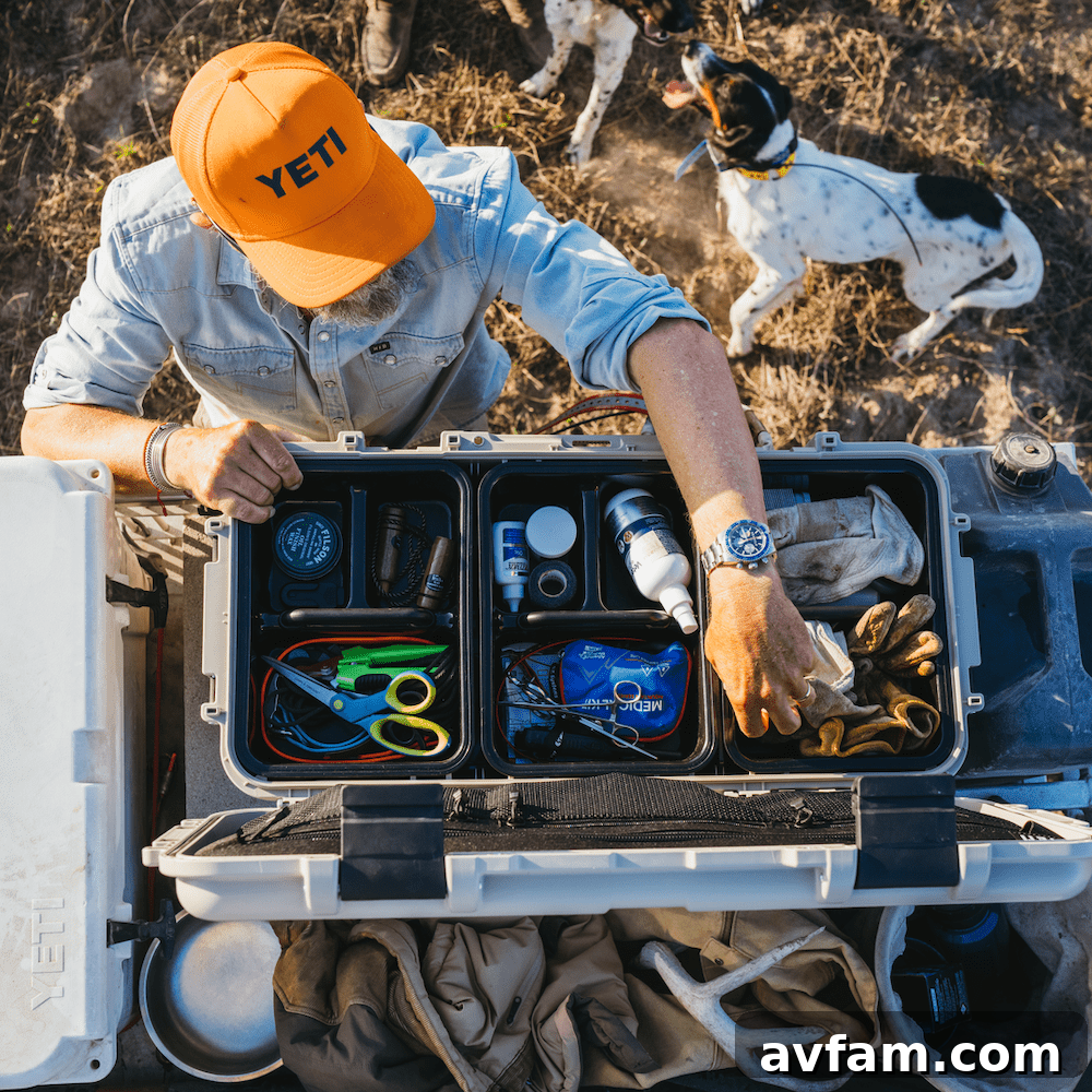 YETI Non-Cooler Gear Assortment A collection of YETI gear including a Camino Carryall tote bag, a Loadout bucket, a GoBox gear case, and a Trailhead camp chair, all designed for durability and outdoor use.
