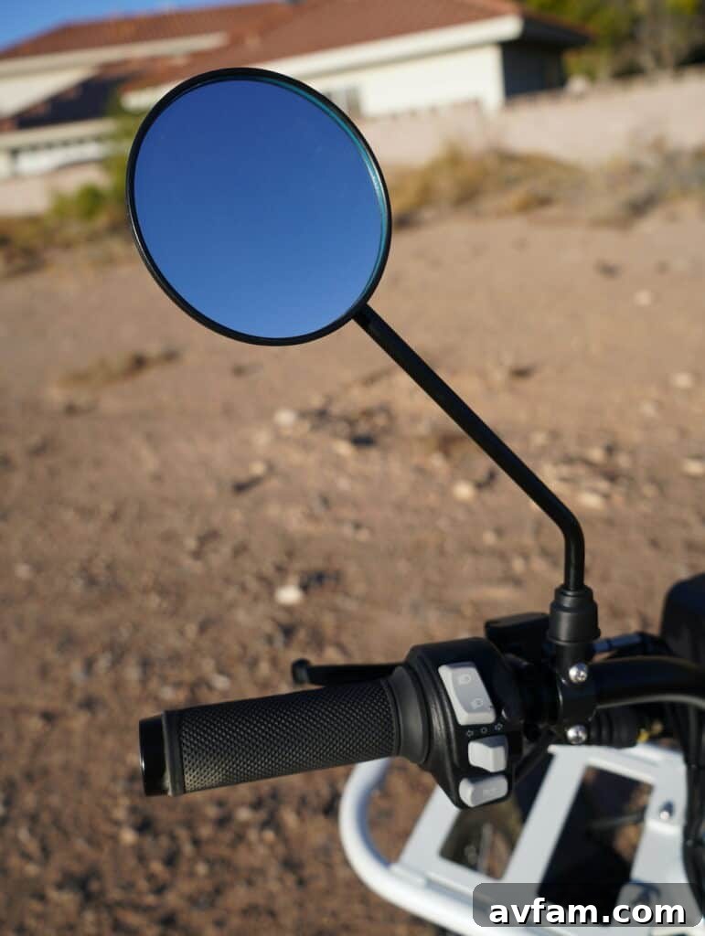 UBCO 2x2 electric bike parked on a scenic overlook